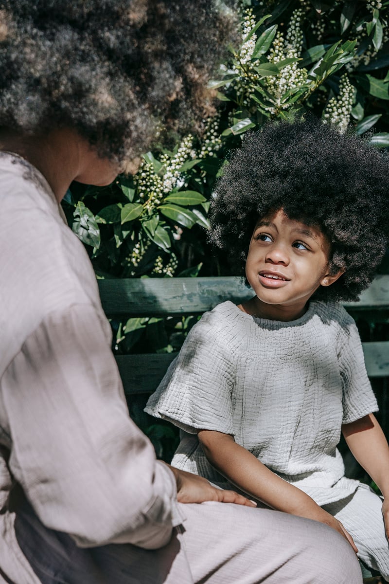 A Child Talking to her Parent